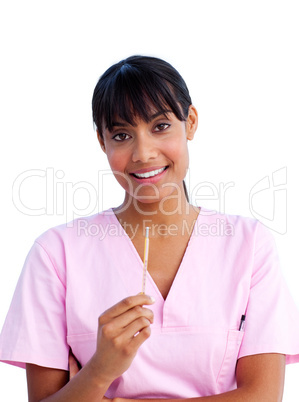 Portrait of a pretty nurse holding a thermometer