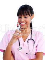 Portrait of a smiling female doctor holding a syringe