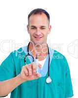Portrait of a mature doctor holding a syringe