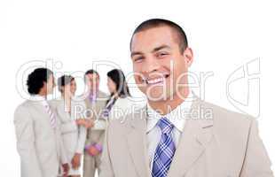 Portrait of caucasian businessman smiling with his team