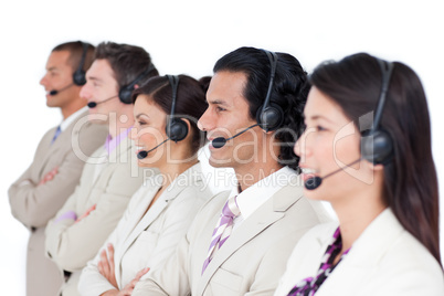 Confident business team lining up with headset on