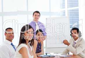 Young businessman presenting figures