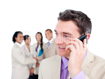 Portrait of a handsome businessman on phone