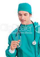 Portrait of a serious surgeon holding surgical forceps