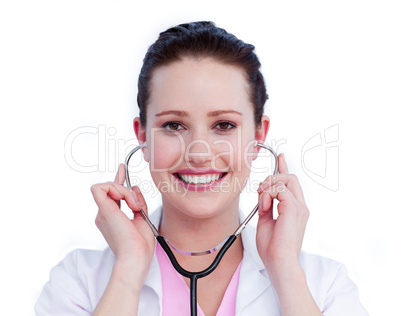 Portrait of an attractive female doctor holding a stethoscope