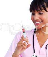 Close-up of a ethnic female doctor holding a syringe