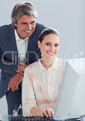 Portrait of a businesswoman and her manager working at a compute