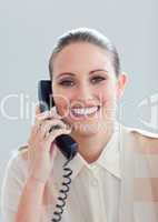 Portrait of a smiling businesswoman talking on phone