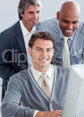 Handsome businessmen working at a computer