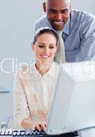 Attractive businesswoman and her manager working at a computer