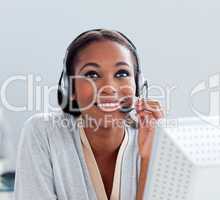 Portrait of a thoughtful businesswoman with headset on