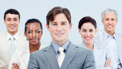 Multi-ethnic business partners standing with folded arms