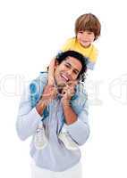 Smiling father having fun with his son