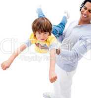 Cheerful father and his boy playing together