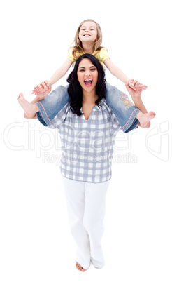 Laughing mother giving piggyback ride to her daughter