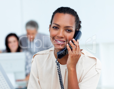 Charming businesswoman talking on phone