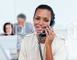 Charming businesswoman talking on phone