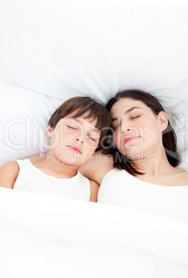 Affectionate mother and her son sleeping