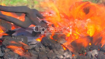 HD Blacksmith tongs glowing metal pattern, closeup