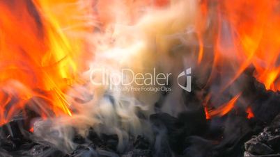 HD  Coal forge with fire and sparks in blacksmith, closeup