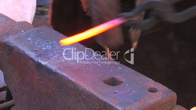 HD Laborious work of blacksmith, closeup