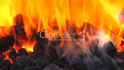 HD Real inferno with smoke and flame in portable blacksmith, closeup