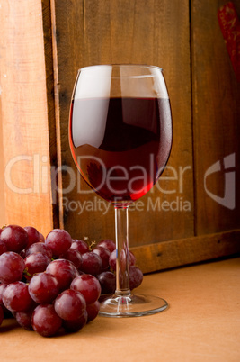 Glass of Red Wine with Grapes