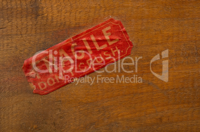 Fragile Label on Wood
