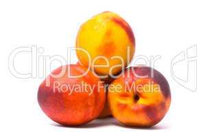 Juicy nectarines on a white background