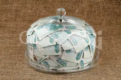 Money and bell glass