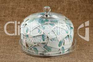 Money and bell glass