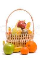 Basket with colorful fruits on a white background