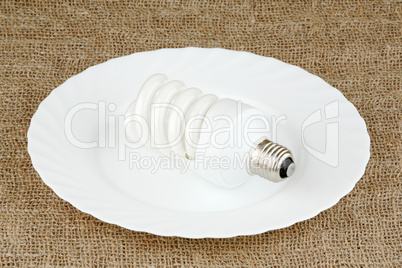 Lightbulb on a white plate