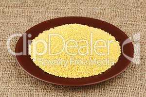 Plate with millet