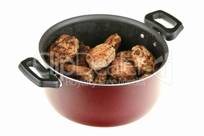 Meat cutlets in a pan