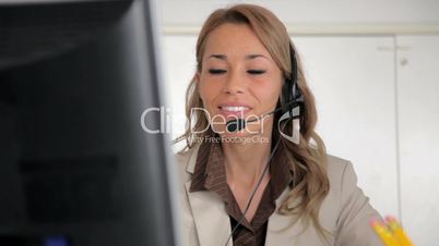 female receptionist working on computer