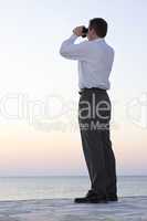 Businessman with binocular