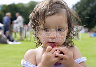 Baby girl eating an apple 4