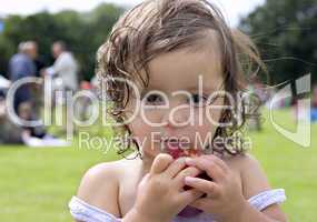 Baby girl eating an apple 4