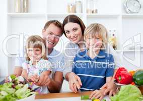 Happy family preparing dinner together