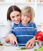 Attractive mother and her son cooking