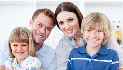 Portrait of a jolly family smiling at the camera