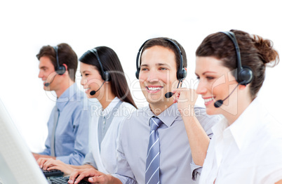Multi-ethnic customer service agents working in a call center
