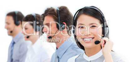 Portrait of smiling customer service agents working in a call ce