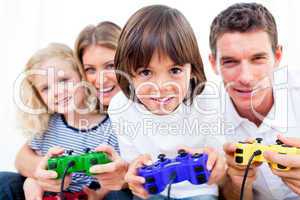 Lively family playing video game