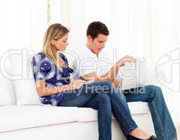 Upset couple stressed with so many bills to pay