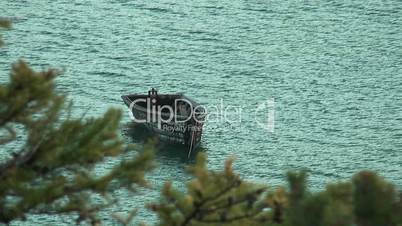 Wooden boat on  Baikal lake