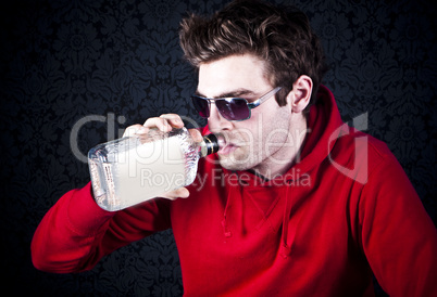 young man drinking and feeling despair