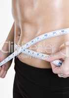 measuring tape around slim beautiful waist