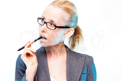 woman chewing pen